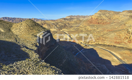 Aerial Virgin River Canyon Rugged Mountains and Winding Highway Arizona Strip Aerial Virgin River Canyon Rugged Mountains and Winding Highway Arizona Strip 142881518