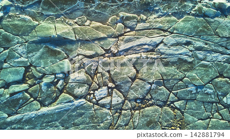 Aerial Frozen Lake Ice Patterns and Cracks Top Down Winter Abstract Aerial Frozen Lake Ice Patterns and Cracks Top Down Winter Abstract 142881794