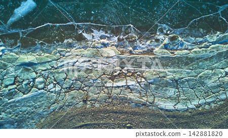 Aerial Frozen Lake Cracked Ice Texture Top Down Winter Nature Aerial Frozen Lake Cracked Ice Texture Top Down Winter Nature 142881820