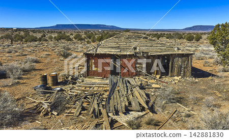 Abandoned Desert Cabin Ruins with Distant Plateau and Mount Trumbull Arizona Abandoned Desert Cabin Ruins with Distant Plateau and Mount Trumbull Arizona 142881830