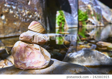 Rock Stack Cairn by Creek in Sunlit Fern Canyon Nevada Rock Stack Cairn by Creek in Sunlit Fern Canyon Nevada 142881915