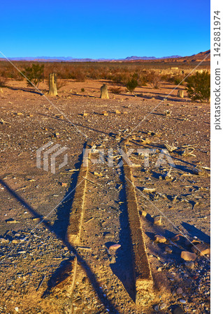 Desert Ghost Town Ruins and Foundations at Golden Hour in Nevada Desert Ghost Town Ruins and Foundations at Golden Hour in Nevada 142881974