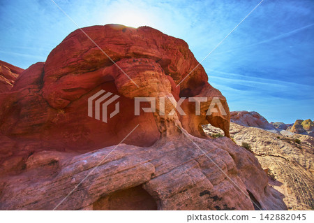 Valley of Fire Red Sandstone Arch with Blue Sky and Desert Landscape Valley of Fire Red Sandstone Arch with Blue Sky and Desert Landscape 142882045