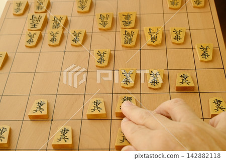 Close-up of a shogi opening move. Close-up of a shogi opening move. 142882118