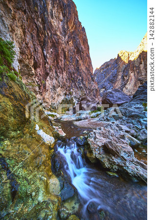 Goldstrike Hot Spring Waterfall and Rocky Canyon Walls in Nevada Goldstrike Hot Spring Waterfall and Rocky Canyon Walls in Nevada 142882144