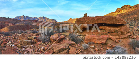 Panorama of Red Rock Formations and Muddy Mountain Desert Landscape under Blue Sky Panorama of Red Rock Formations and Muddy Mountain Desert Landscape under Blue Sky 142882230