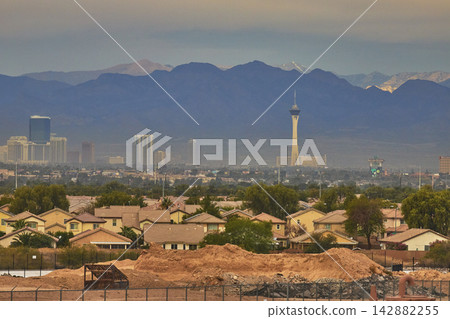 Las Vegas Strip Skyline Residential Neighborhood and Mt Charleston Mountain Backdrop Las Vegas Strip Skyline Residential Neighborhood and Mt Charleston Mountain Backdrop 142882255