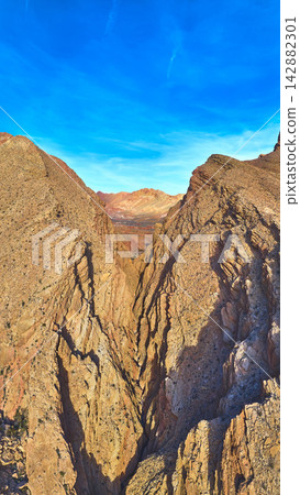 Aerial Anniversary Narrows Canyon Dramatic Rock Formations and Blue Sky Aerial Anniversary Narrows Canyon Dramatic Rock Formations and Blue Sky 142882301
