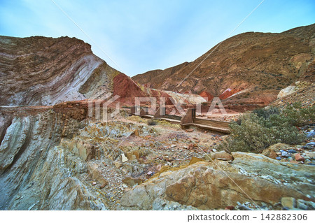 Abandoned Anniversary Mine Concrete Structure and Colorful Rock Formations Nevada Abandoned Anniversary Mine Concrete Structure and Colorful Rock Formations Nevada 142882306