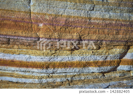 Colorful Sandstone Layers and Textured Rock Surface Valley of Fire Nevada Colorful Sandstone Layers and Textured Rock Surface Valley of Fire Nevada 142882405
