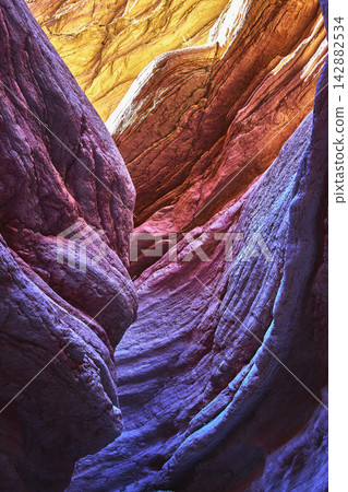 Colorful Slot Canyon Walls with Dramatic Light and Texture in Nevada Colorful Slot Canyon Walls with Dramatic Light and Texture in Nevada 142882534