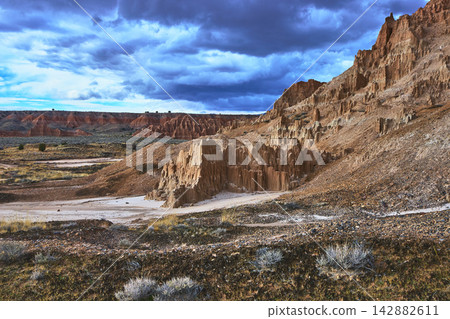 Cathedral Gorge State Park Dramatic Sandstone Formations Desert Landscape Under Stormy Sky Cathedral Gorge State Park Dramatic Sandstone Formations Desert Landscape Under Stormy Sky 142882611