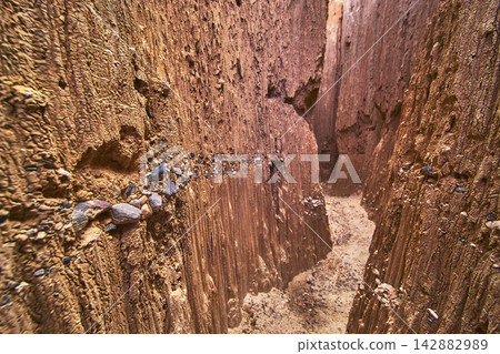 Cathedral Gorge Slot Canyon Rugged Eroded Walls and Sandy Trail Nevada Cathedral Gorge Slot Canyon Rugged Eroded Walls and Sandy Trail Nevada 142882989