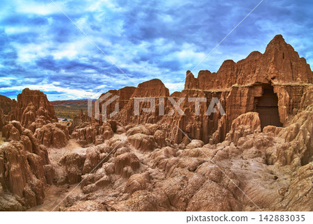 Panorama of Dramatic Slot Canyon Formations and Rugged Cliffs Under Moody Sky Panorama of Dramatic Slot Canyon Formations and Rugged Cliffs Under Moody Sky 142883035