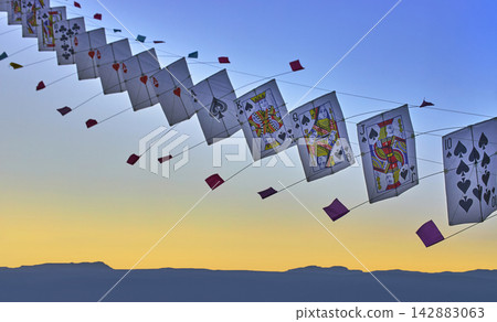 Kite Festival Playing Cards in Sky with Mountains at Golden Hour Las Vegas Nevada Kite Festival Playing Cards in Sky with Mountains at Golden Hour Las Vegas Nevada 142883063