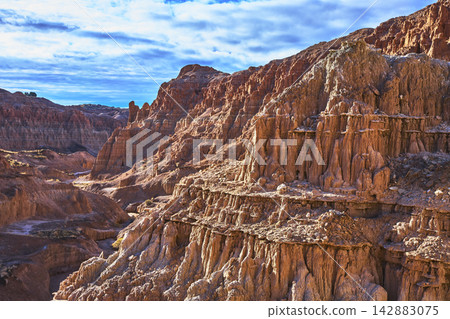 Eroded Red Rock Formations and Canyon Walls in Cathedral Gorge State Park Nevada Eroded Red Rock Formations and Canyon Walls in Cathedral Gorge State Park Nevada 142883075