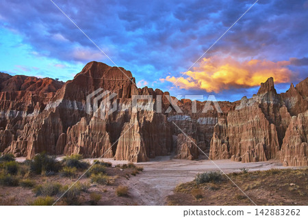 Cathedral Gorge State Park Sandstone Formations at Golden Hour Under Dramatic Sky 142883262