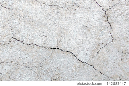 Rough, weathered, and cracked white plaster or concrete walls. Rough, weathered, and cracked white plaster or concrete walls. 142883447