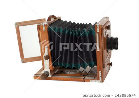 Old antique vintage black camera the 19th century isolated on white background with cliping path. Russia. Old antique vintage black camera the 19th century isolated on white background with cliping path. Russia. 142886674