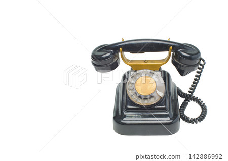 Old grunge vintage Dial Phone on white isolated Old grunge vintage Dial Phone on white isolated 142886992