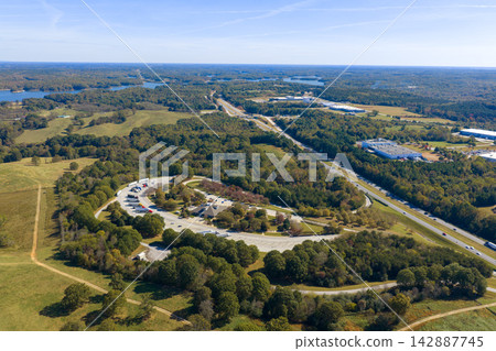 Large truck stop rest area on interstate freeway for trucks overnight parking. Recreational place during long traveling. Large truck stop rest area on interstate freeway for trucks overnight parking. Recreational place during long traveling. 142887745