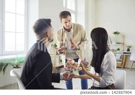 Love triangle conflict with jealous man interrupting dramatic romantic proposal Love triangle conflict with jealous man interrupting dramatic romantic proposal 142887904