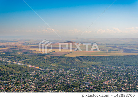 Panoramic view of Pyatigorsk on a summer day, resort town in Stavropol region, Russia. Russia. View from the top of Mount Mashuk in Pyatigorsk, Panoramic view of Pyatigorsk on a summer day, resort town in Stavropol region, Russia. Russia. View from the top of Mount Mashuk in Pyatigorsk, 142888700