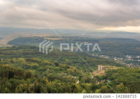 Layers of green mountains and hills in the haze during sunset. Panoramic View of Green hills and Meadow. Layers of green mountains and hills in the haze during sunset. Panoramic View of Green hills and Meadow. 142888715