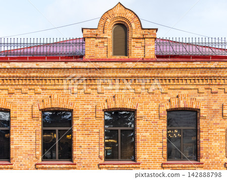 Four windows of the old mansion 19 century with brown bricks wall Four windows of the old mansion 19 century with brown bricks wall 142888798