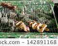 炭火烤全魷魚，香氣撲鼻，外皮酥脆（海鮮燒烤/街頭小吃） 142891168