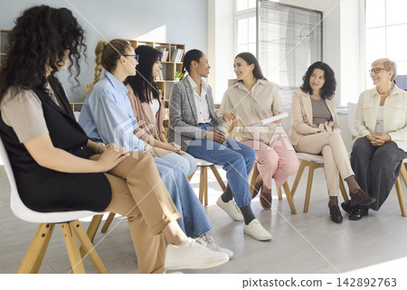 Women business team in circle meeting for training, coaching and discussion Women business team in circle meeting for training, coaching and discussion 142892763