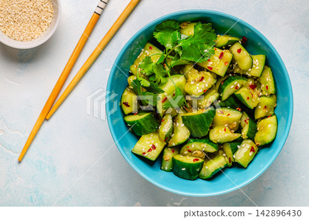 Chinese smashed cucumber salad with sesame Chinese smashed cucumber salad with sesame 142896430