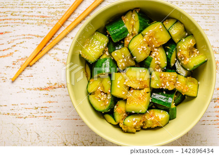 Chinese smashed cucumber salad with sesame Chinese smashed cucumber salad with sesame 142896434