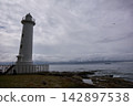 [Minamichita] Noma Lighthouse stands tall against the cloudy sky. 142897538