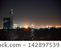 [Nagoya] Night view of Nagoya Port and a tower displaying navigation control signals 142897539