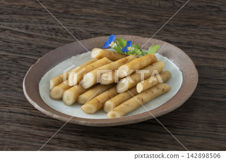 Pickled burdock root in soy sauce Pickled burdock root in soy sauce 142898506