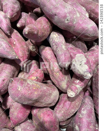 Fresh Purple Japanese Sweet Potatoes Displayed In Supermarket Fresh Purple Japanese Sweet Potatoes Displayed In Supermarket 142898538