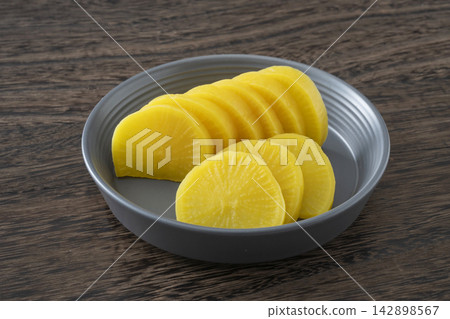 Pickled daikon radish Pickled daikon radish 142898567