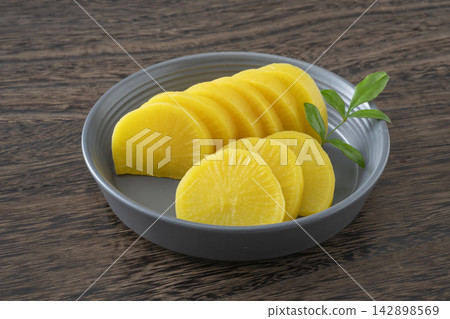 Pickled daikon radish Pickled daikon radish 142898569