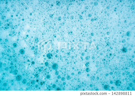 Soap foam in blue basin Soap foam in blue basin 142898811