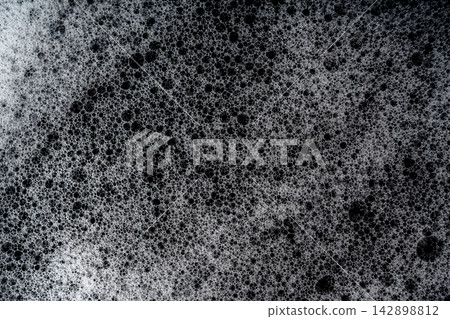 Soap foam on black background Soap foam on black background 142898812