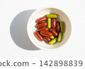 Brown gel pills, dark red capsules close up 142898839