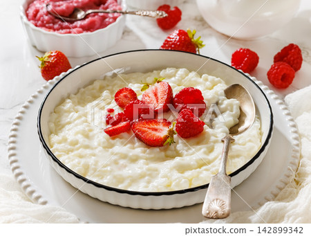 Risalamande Danish rice pudding with fresh berries 142899342