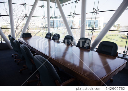 Middle Eastern business people in a modern open office conference room for a corporate meeting 142900762
