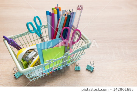 Shopping for colorful school and office supplies Shopping for colorful school and office supplies 142901693