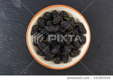 fresh Large Black Mulberries Rich in Antioxidants fresh Large Black Mulberries Rich in Antioxidants 142903056