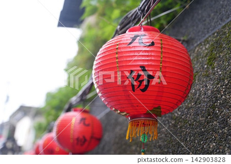 Red lanterns adorn the streets of Jiufen, Taiwan. Red lanterns adorn the streets of Jiufen, Taiwan. 142903828