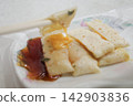 A classic Taiwanese breakfast: Danbing (egg pancake) with plenty of cheese. 142903836