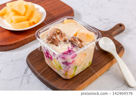 melon Yogurt Fruit Dessert with Mixed Fresh Ingredients 142904576