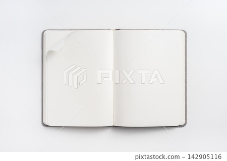 Top view of open blank notebook mockup on white background Top view of open blank notebook mockup on white background 142905116